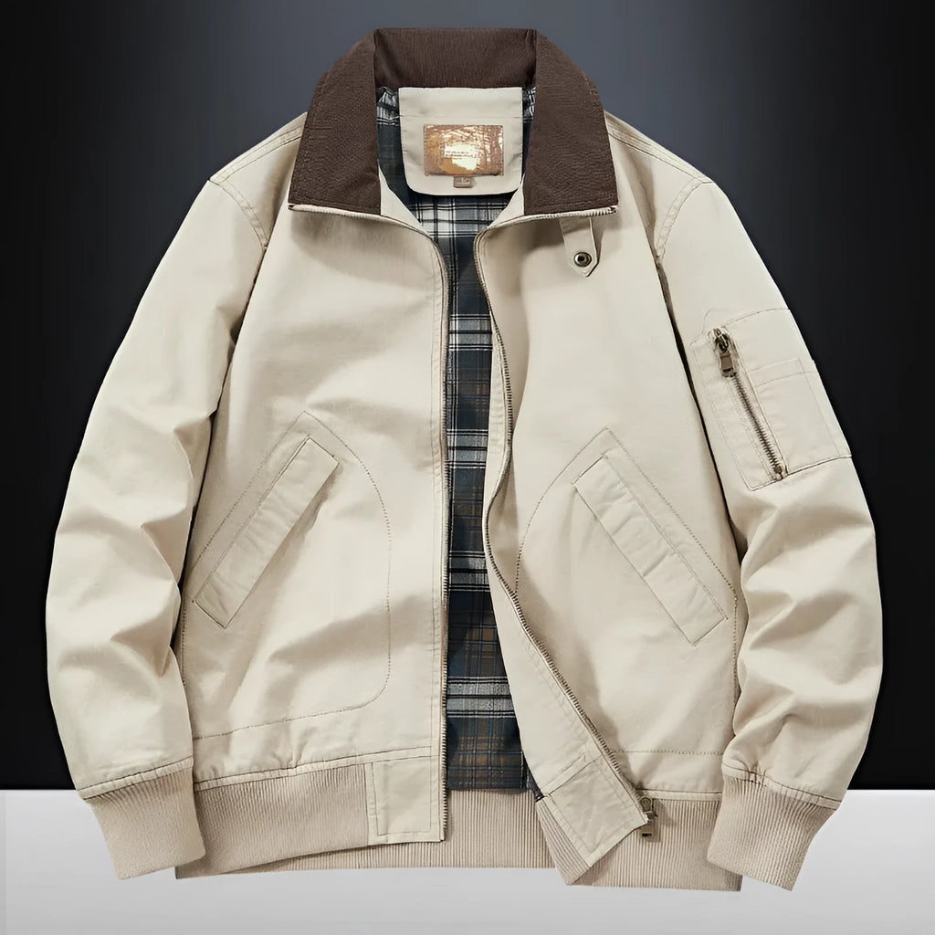 Men's beige washed cotton baseball-style flight jacket shown on a hanger.