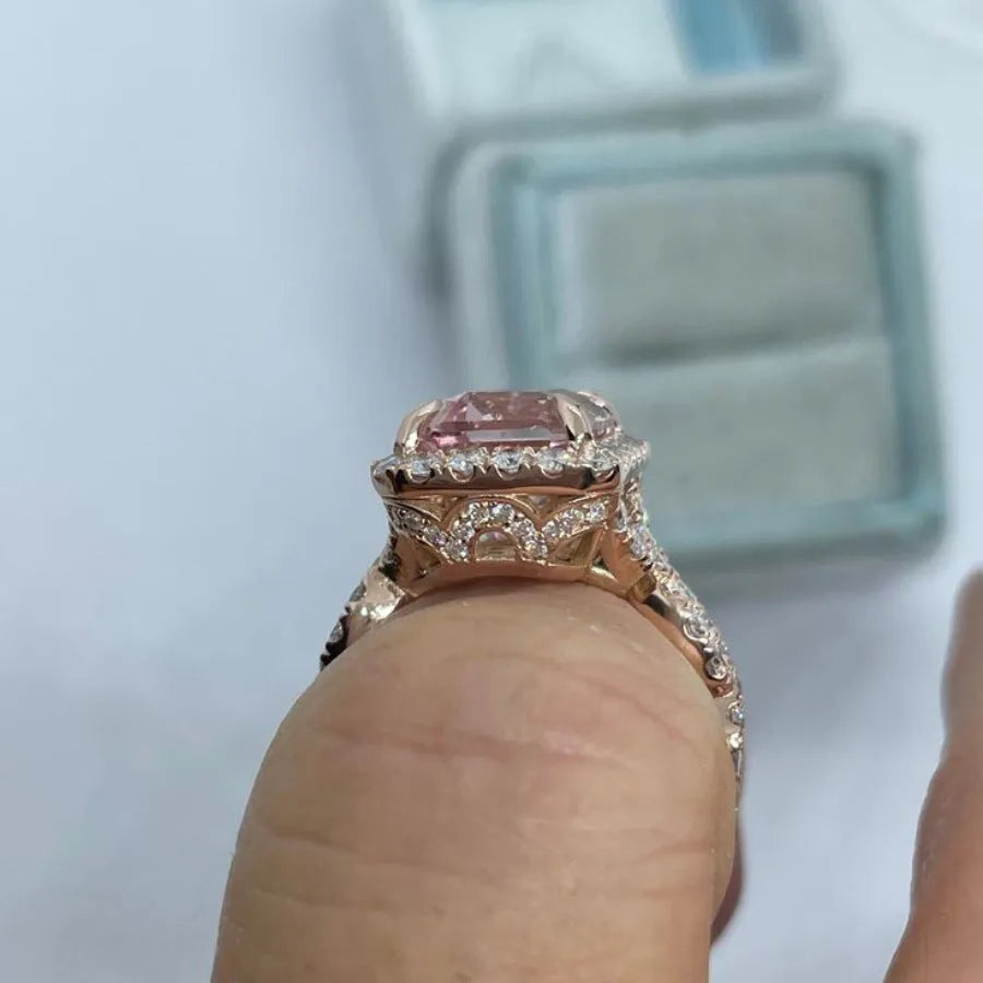 Rose gold electroplated alloy ring with geometric shape design showing angular lines and metallic finish