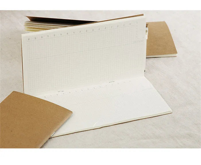 Cowhide diary refill inner core showing 11x21cm size and saddle stitch binding