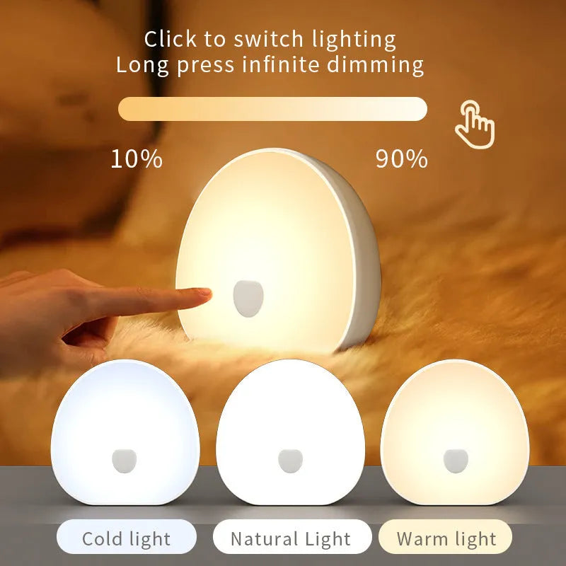 White rechargeable baby night feeding comforter with music function on display