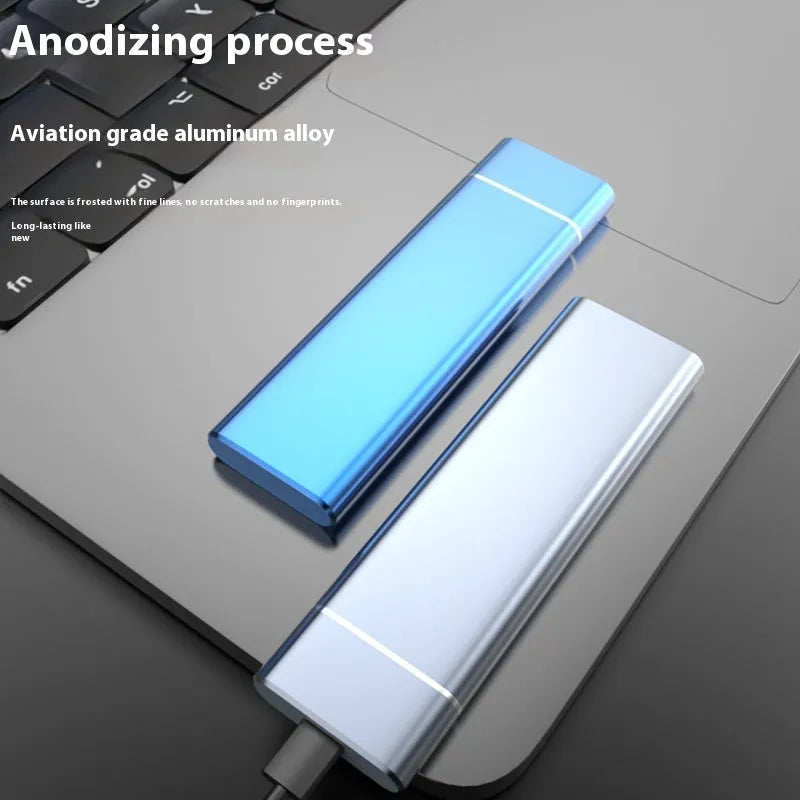 Sapphire blue portable external solid state hard disk drive with metal shell next to a USB cable.
