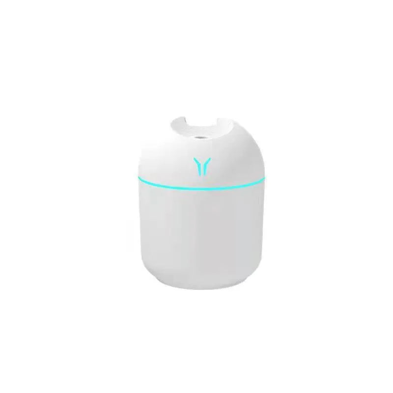 Round desktop USB humidifier in ivory white, sky blue, or girlish pink with 250ml water tank.