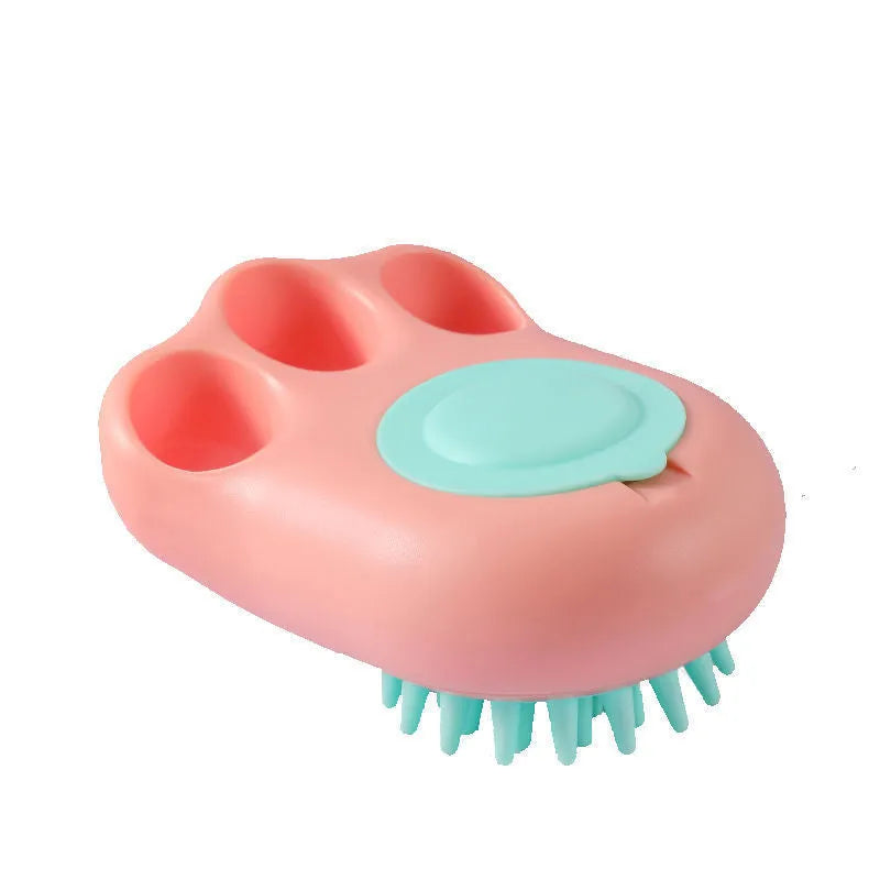 Blue pet bath and massage brush with soft silicone bristles and a plastic handle for cats and dogs.