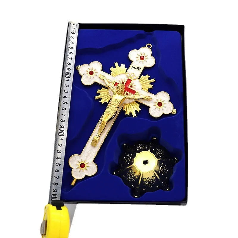 Close-up of a geometric zinc alloy desktop ornament with micro-inlaid detail in a gold and blue finish.
