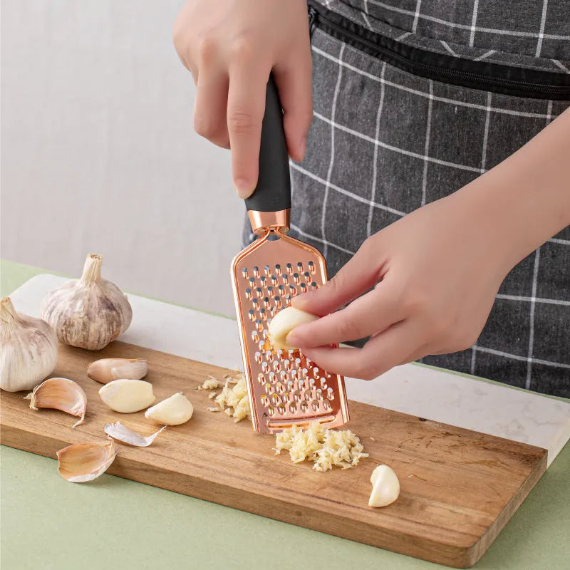 Seven-piece stainless steel kitchen utensil set in rose gold, mint green, pink, white, black, grey, or blue colour options