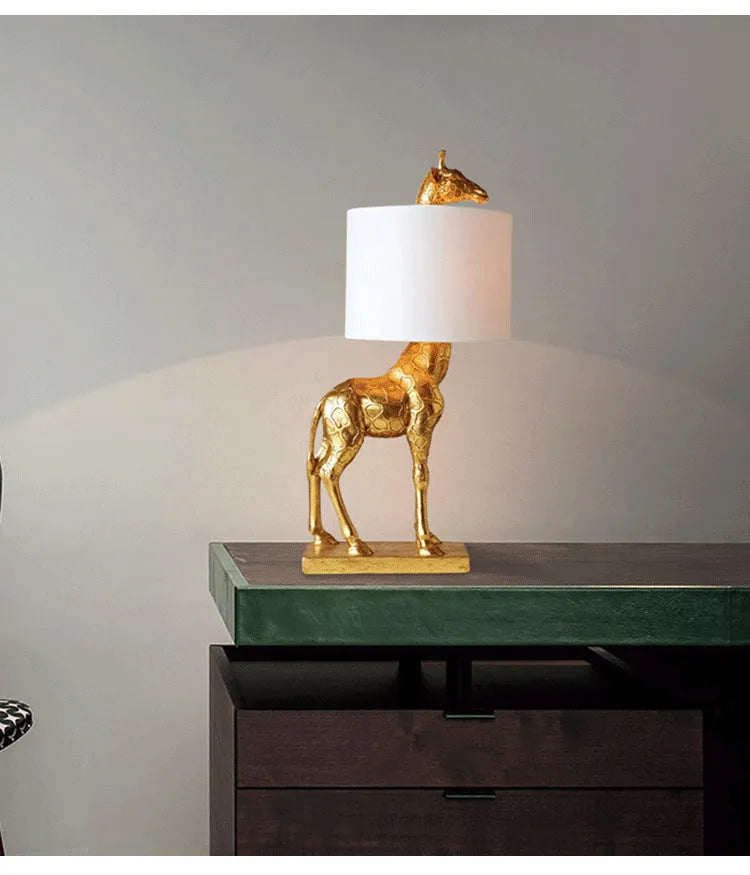 White or gold giraffe table lamp 66cm tall with fabric shade