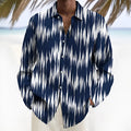 Men's multi-colour geometric pattern long sleeve cardigan shirt on a hanger.