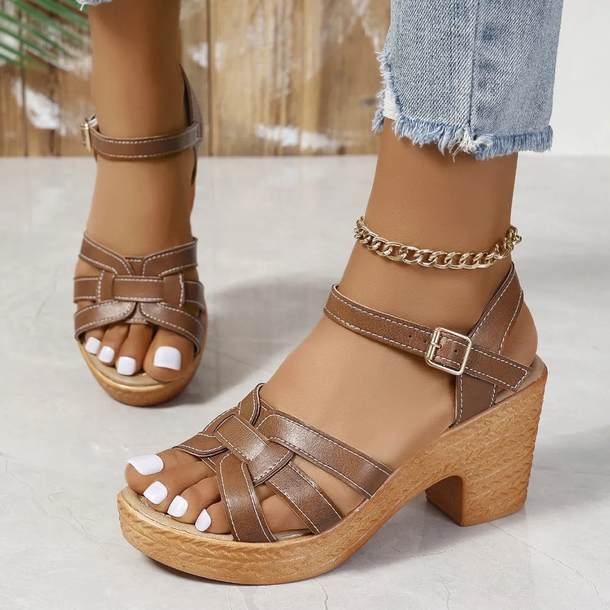 Plus size black Roman-style women's peep toe sandals with chunky heel and ankle-strap buckle.