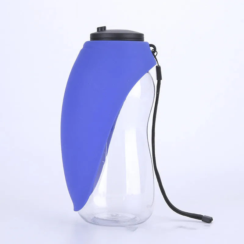 Portable dog water bottle with drinking bowl showing 680ml capacity and key-lock cap mechanism