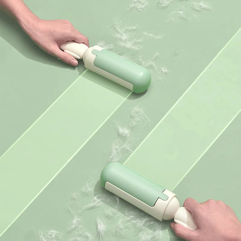 White green coloured pet hair remover roller with a non-slip handle on a fabric sofa.