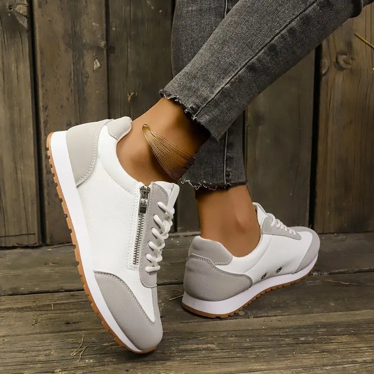Women's flat-heeled shoes in champagne, grey, and white colours with artificial PU upper and rubber sole
