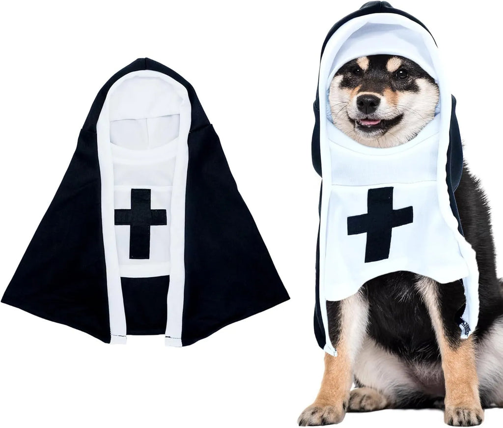 Black and white nun costume cloak on a small dog for Halloween.