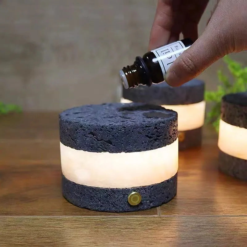 Small orange volcanic rock USB night lamp with touch dimming and essential oil diffuser.