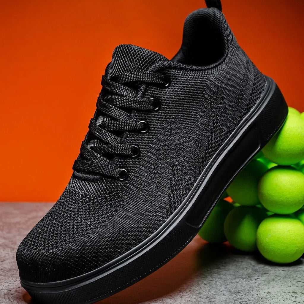 Flat heel casual board shoes with mesh upper and EVA sole in black or white colours