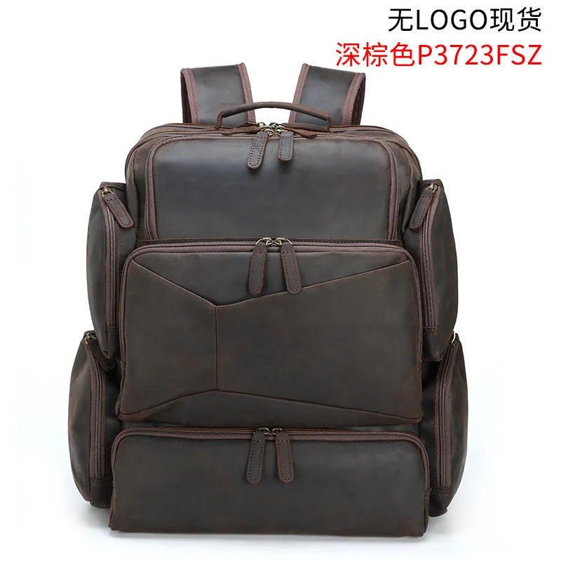 Dark brown genuine cowhide leather backpack with double shoulder straps and organisational compartments for 17-inch laptop