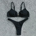 Women's two-piece bikini set in polyester with top and shorts, available in five colours and sizes S to XL.
