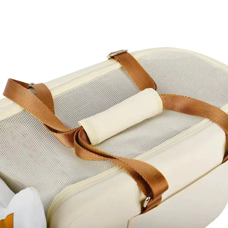 Beige hard-sided cat carrier with one-shoulder strap, EPE padding interior, dimensions 43x25x22.5cm