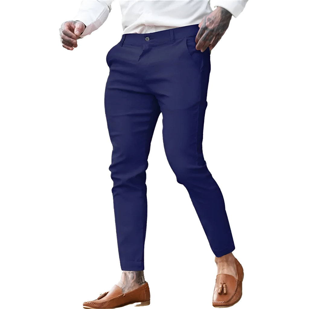 Men's slim fit pencil trousers in stretch cotton twill fabric, shown in a solid colour with a zip fly and mid-waist design.