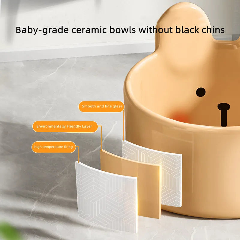 Ceramic pet bowl with neck guard design in white rabbit pattern, shown next to a large brown bear pattern bowl.
