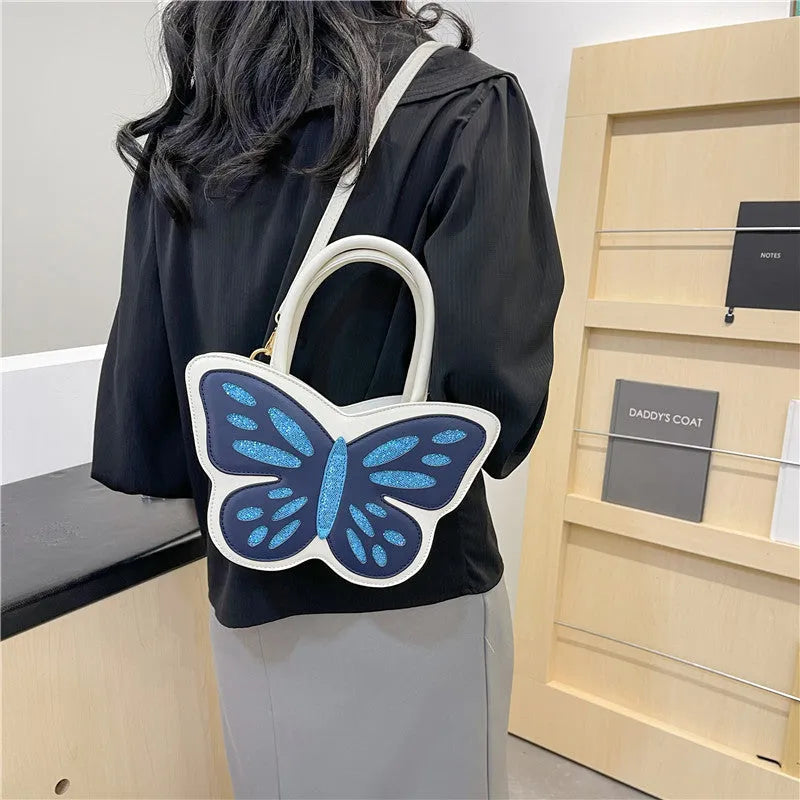 Square crossbody bag in PU material with contrast colour detailing, dimensions 27cm by 14cm