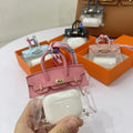 Women's artificial leather car key case showing luxury pattern designs in multiple colour options