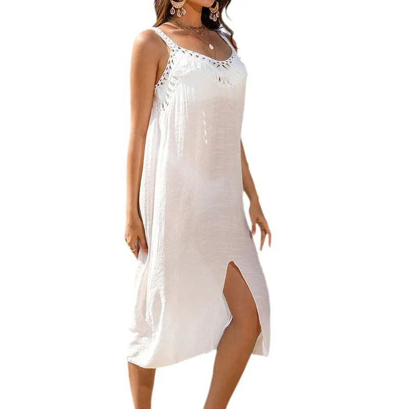 White suspender beach dress with hollow crochet weaving and bottom slit, made from polyester for swimming and casual activities
