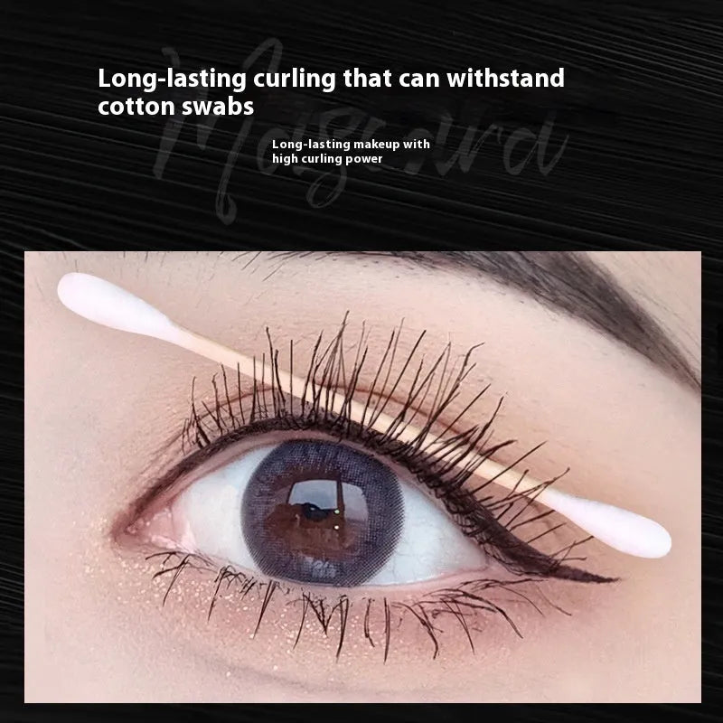 Black natural curly long mascara tube showing 14cm height with brush applicator
