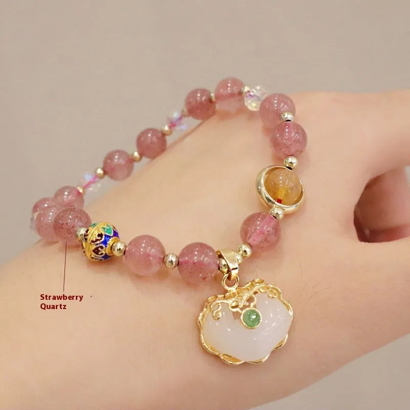 Women's ethnic bracelet with grey jade beads, strawberry quartz stones and geometric metal decorations