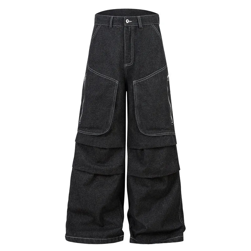 Black pleated multi-pocket workwear jeans with a mid waist and zip fly.