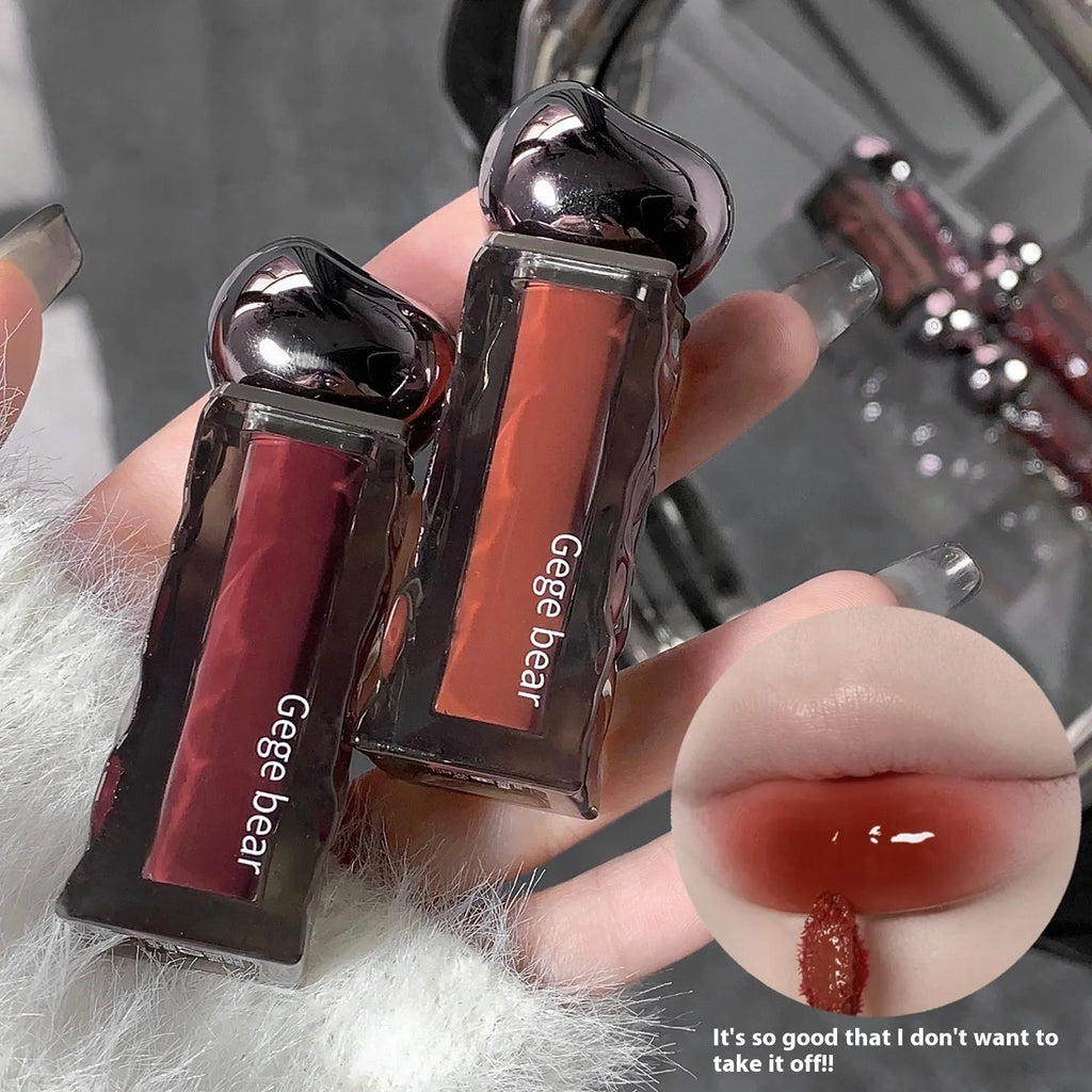 Glacier Lava Lip Lacquer in a tube showing its water light mirror gloss finish.