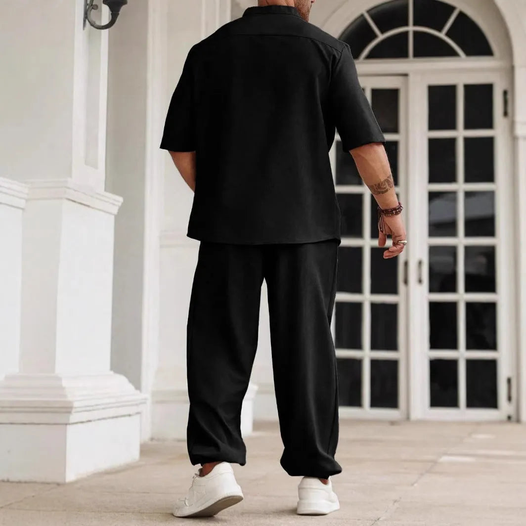 Men's apricot coloured cotton linen casual short-sleeved shirt and matching trousers laid flat.