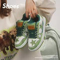 Pair of denim couple skateboard shoes with round toe, flat rubber sole, and mesh lining in black colour.