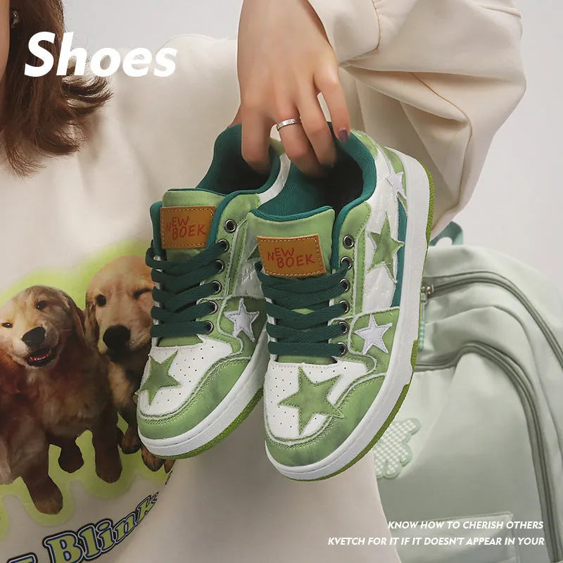 Pair of denim couple skateboard shoes with round toe, flat rubber sole, and mesh lining in black colour.
