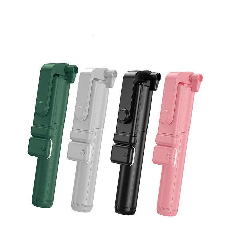 Black Bluetooth selfie stick with integrated tripod legs extended, showing 360-degree rotation mechanism and phone holder
