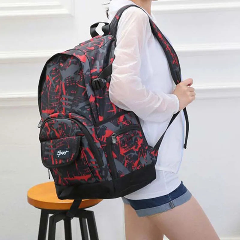 Blue classic nylon backpack with front zipped pocket, showing adjustable padded shoulder straps and 30-litre capacity