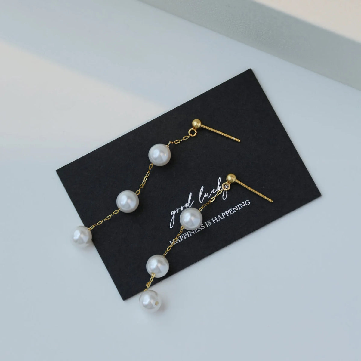 Long star fringe earrings for women in 925 silver with gold or white gold electroplated finish and U-shaped design