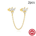S925 sterling silver earrings with golden finish and inlaid zircon in geometric shapes including clover and crown designs
