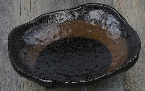 Irregular shaped coarse pottery sashimi bowl with floral decorations, measuring 24cm length, from Chaozhou porcelain