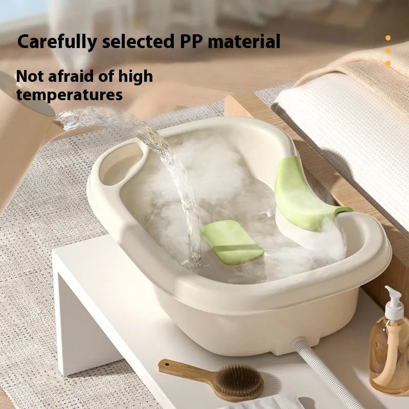 Portable bed shampoo basin with integrated neck pillow, circulating water pump, drain pipe, and massage brush for hair washing while lying down