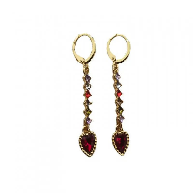Gold and silver heart-shaped earrings with electroplated finish, showing front and back views
