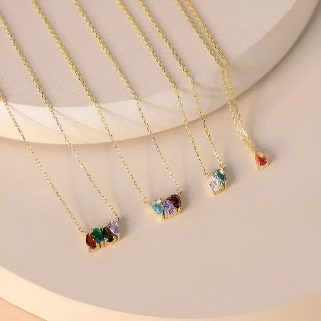 Zircon stone set on a titanium steel clavicle chain necklace in an electroplated silver finish.