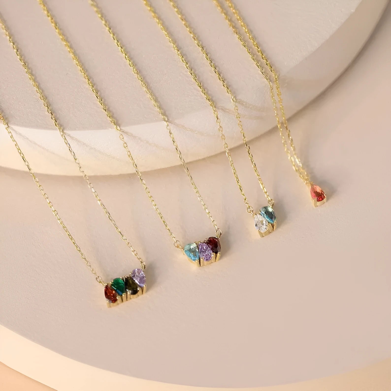 Zircon stone set on a titanium steel clavicle chain necklace in an electroplated silver finish.