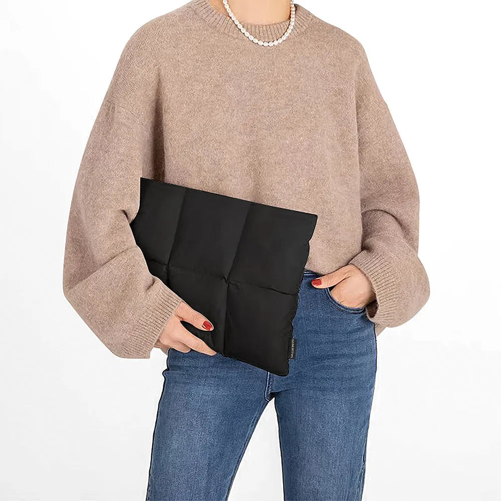 Soft and fluffy laptop sleeve in black or khaki with retro sewing thread details, sized for 13-15.6 inch devices