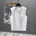Solid colour loose fit cotton sleeveless t-shirt on a hanger, shown in black and white colour options.