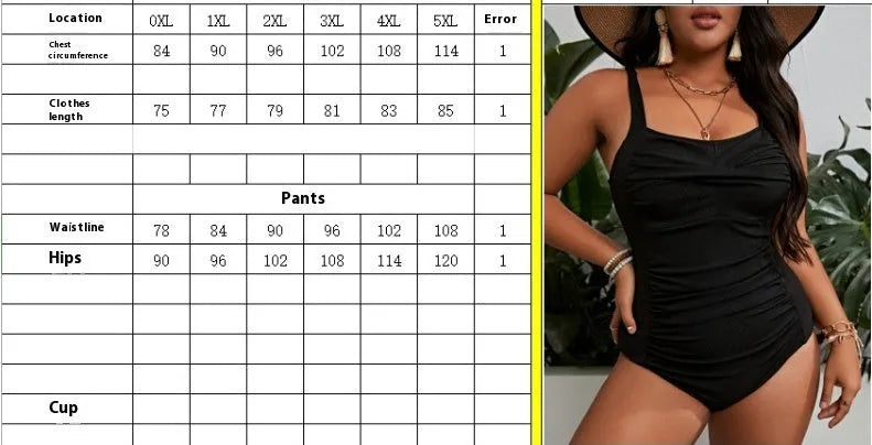 Black plus size one-piece swimsuit for women on a hanger
