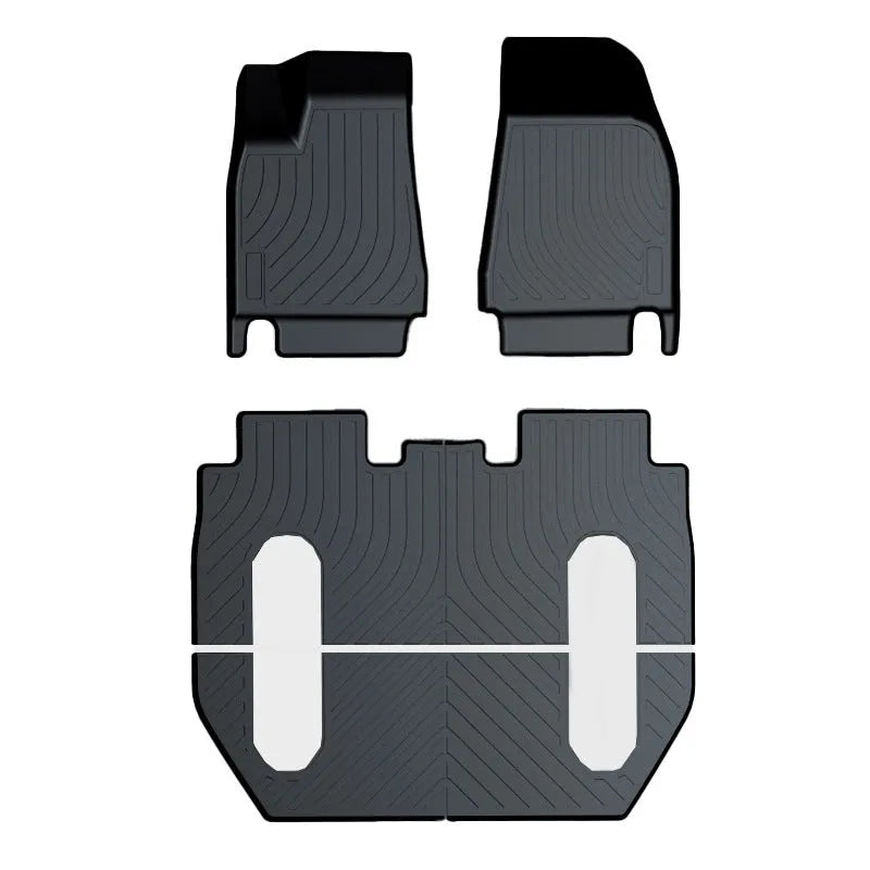 Rubber floor mats for Tesla cars with TPE footrest, custom-fit to Model 3, Y, S, X interiors, showing non-slip backing and textured surface
