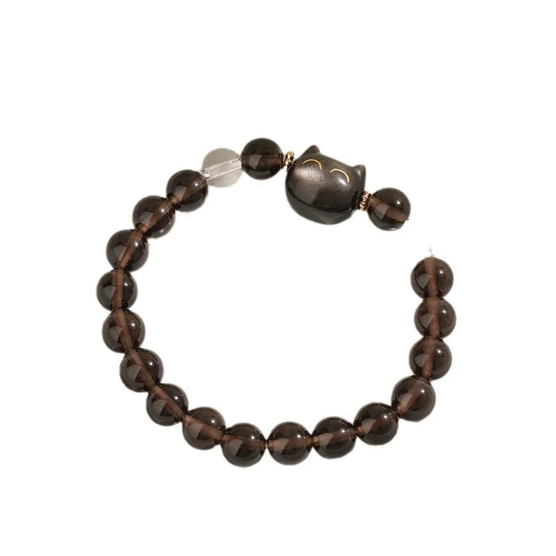 Women's silver stone bracelet with detailed opal cat head charm and 8mm setting