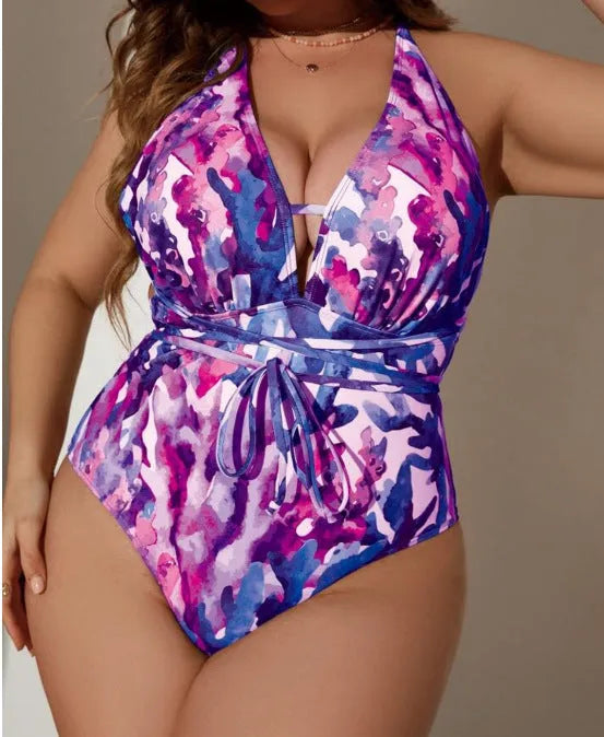 Blue one-piece halter swimsuit with brief cut on mannequin showing European American styling