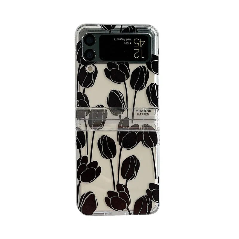 Clear Samsung Galaxy Z Flip phone case with floral pattern, available in Daisy and Tulip designs.