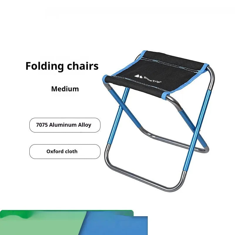 Black aluminium alloy folding stool with ethnic pattern, folded for compact storage
